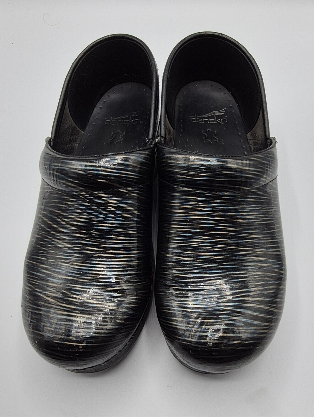 Dansko Black Multicolor Patterned Clogs